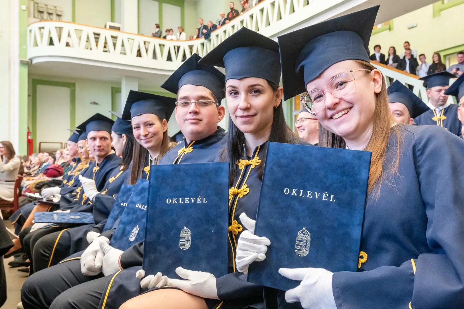 The graduates received their diplomas, beaming with pride and joy (Photo: András Adorján)